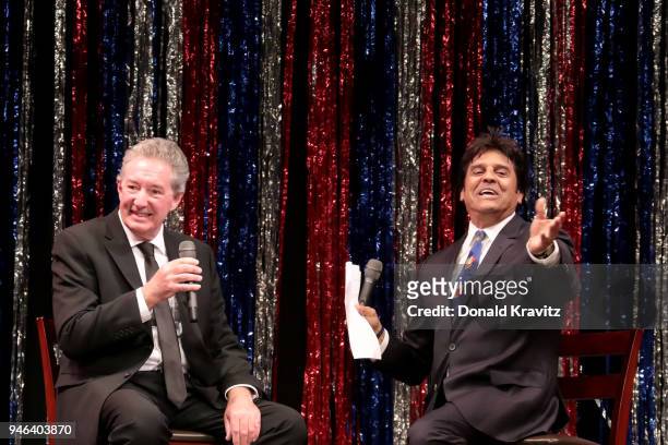 Erik Estrada asks an interview question of contestant, Mark Honickel as part of the On Stage Interview at the 2018 Mr. Mature America Pageant at The...