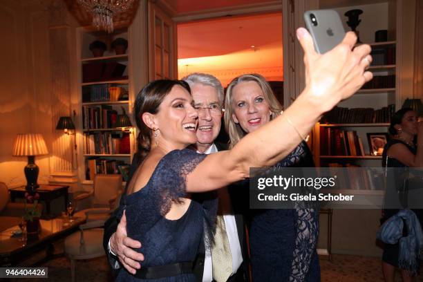 Nazan Eckes and Frank Elstner and his wife Britta Elstner take a selfie during the Gala Spa Awards at Brenners Park-Hotel & Spa on April 14, 2018 in...