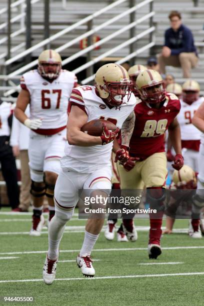 Running Back Ben Glines carries around end during the Boston College Jay McGillis Memorial Spring Game on April 14 at Alumni Stadium in Chestnut...