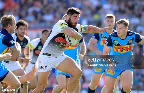 James Tamou of the Panthers forces his way through the Titans defence to score a tryduring the round six NRL match between the Penrith Panthers and...