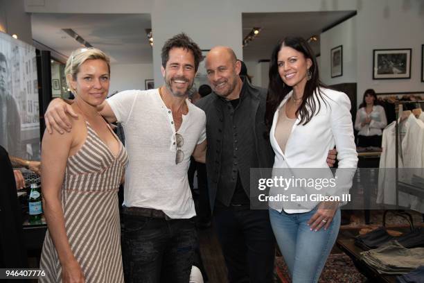 Guest, Shawn Christian, John Varvatos and Krista Weissmuller pose for a photo at the West Hollywood store on April 14, 2018 in West Hollywood,...