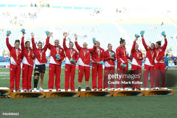 Bronze medalists England pose during the medal ceremony for the Women's Gold Medal Rugby Sevens Match between Australia and New Zealand on day 11 of...