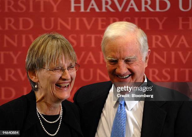 Historian Drew Gilpin Faust shares a laugh with interim and former Harvard president Derek Bok at a news conference Feb. 11, 2007 in Cambridge,...