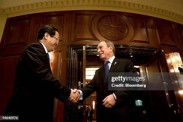 Michael Bloomberg, New York City mayor , right, meets with Yu Zhengsheng, party secretary of the Shanghai Municipal Committee of the Communist Party...