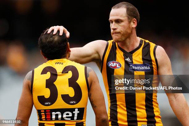 Jarryd Roughead of the Hawks and Cyril Rioli of the Hawks celebrate a goal during the round four AFL match between the Hawthorn Hawks and the...