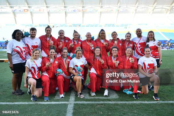 Bronze medalists England pose during the medal ceremony for the Women's Gold Medal Rugby Sevens Match between Australia and New Zealand on day 11 of...