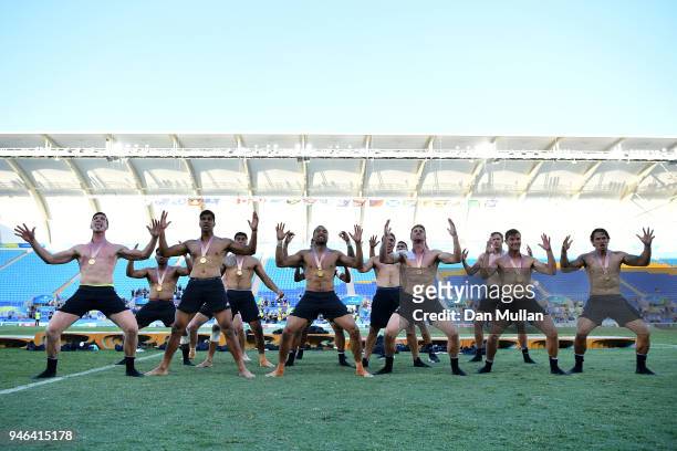 Gold medalists New Zealand perform a Haka during the medal ceremony for the Men's Gold Medal Rugby Sevens Match between Fiji and New Zealand on day...