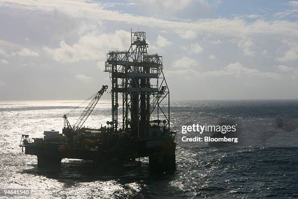 Cajun Express, a Transocean semisubmersible deepwater drilling oil rig, is seen from the air, Monday, December 11 at Chevron Corp.'s Tahiti field at...