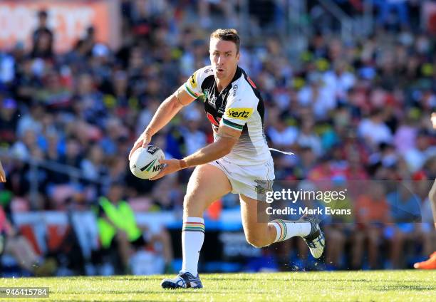 James Maloney of the Panthers runs with the ball during the round six NRL match between the Penrith Panthers and the Gold Coast Titans on April 15,...