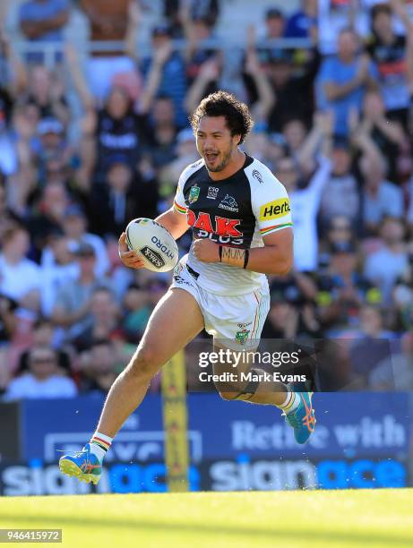 Corey Harawira-Naera of the Panthers runs with the ball to score a try during the round six NRL match between the Penrith Panthers and the Gold Coast...