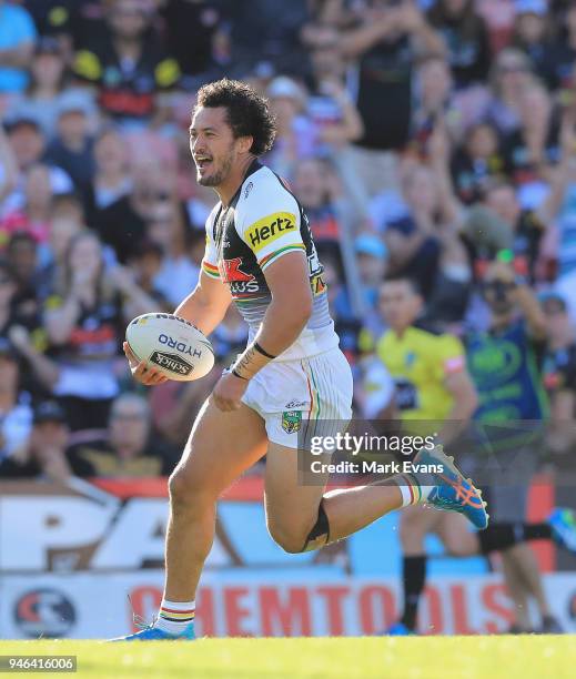 Corey Harawira-Naera of the Panthers runs with the ball to score a try during the round six NRL match between the Penrith Panthers and the Gold Coast...