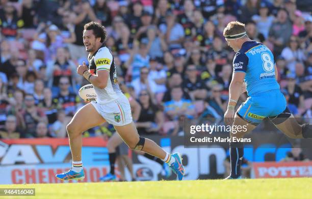 Corey Harawira-Naera of the Panthers runs with the ball to score a try during the round six NRL match between the Penrith Panthers and the Gold Coast...