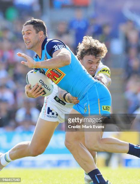 Michael Gordon of the Titans is tackled by James Fisher-Harris of the Panthers during the round six NRL match between the Penrith Panthers and the...