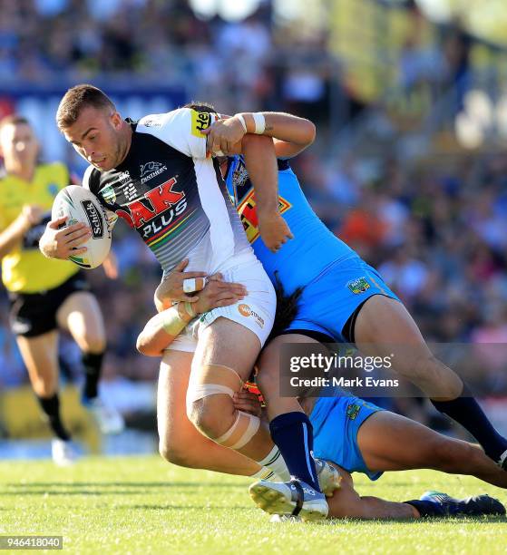 Kaide Ellis of the Panthers is tackled during the round six NRL match between the Penrith Panthers and the Gold Coast Titans on April 15, 2018 in...