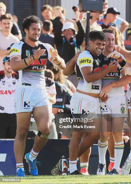 Tyrone Peachey of the Panthers celebrates a try with James Maloney during the round six NRL match between the Penrith Panthers and the Gold Coast...