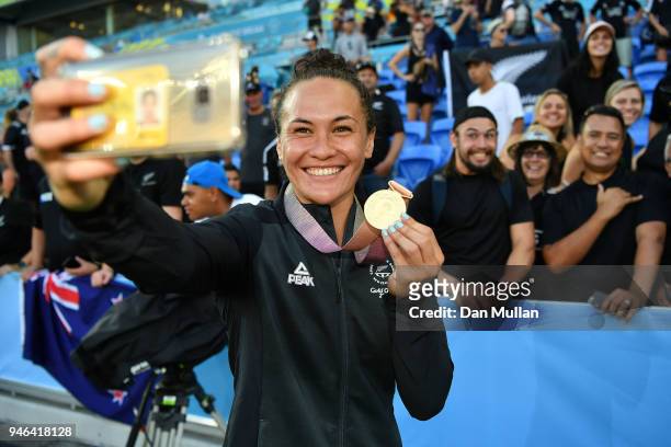 Portia Woodman of New Zealand poses with her gold medal after the Women's Gold Medal Rugby Sevens Match between Australia and New Zealand on day 11...