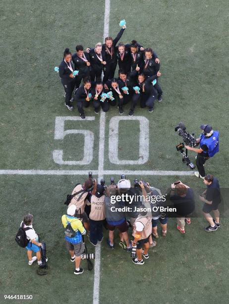 New Zealand Womens team celebrate winning the Gold Medal during Rugby Sevens on day 11 of the Gold Coast 2018 Commonwealth Games at Robina Stadium on...