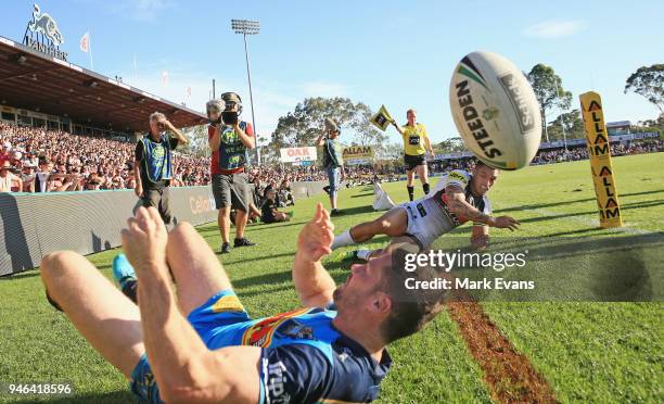 Dean Whare of the Panthers forces Anthony Don of the Titans into touch just short of the tryline during the round six NRL match between the Penrith...