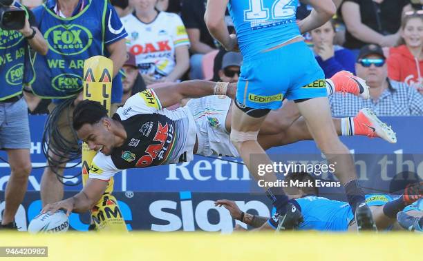 Christian Crichton of the Panthers scores a try during the round six NRL match between the Penrith Panthers and the Gold Coast Titans on April 15,...