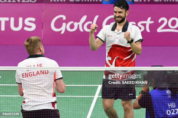 England's Marcus Ellis and Chris Langridge celebrate their victory over India's Satwik Rankireddy and Chirag Chandrashekhar Shetty in the men's...