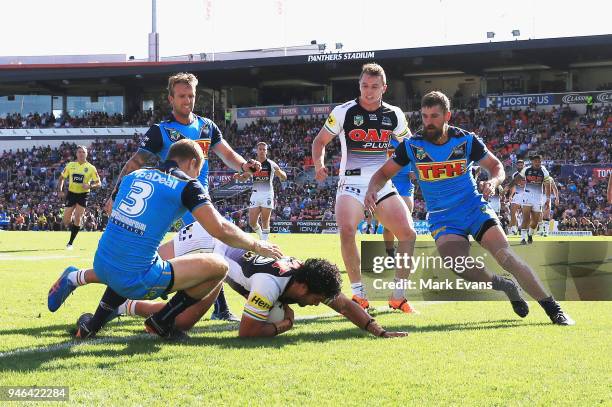 Corey Harawira-Naera of the Panthers scores a try during the round six NRL match between the Penrith Panthers and the Gold Coast Titans on April 15,...