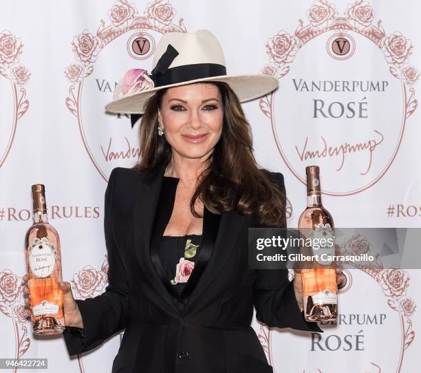 Personality Lisa Vanderpump signs bottles of Vanderpump Rose at the Fine Wine & Good Spirits Premium Collection store on April 14, 2018 in Ardmore,...