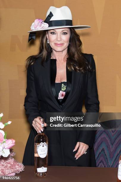 Personality Lisa Vanderpump signs bottles of Vanderpump Rose at the Fine Wine & Good Spirits Premium Collection store on April 14, 2018 in Ardmore,...