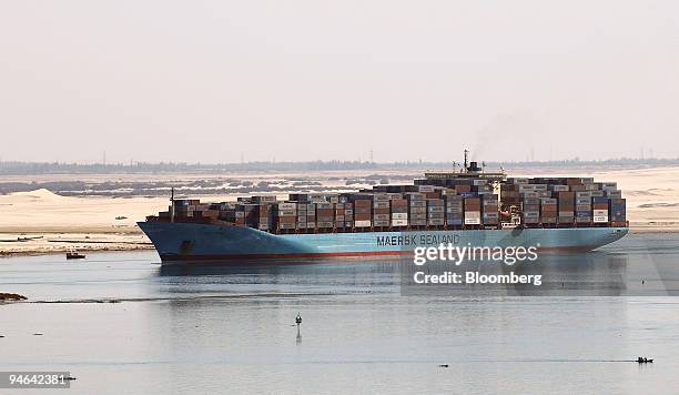 The Sally Maersk, a container ship owned by the Danish shipping line A.P. Moeller-Maersk A/S, sails northbound on the Suez Canal in Ismailia, Egypt,...