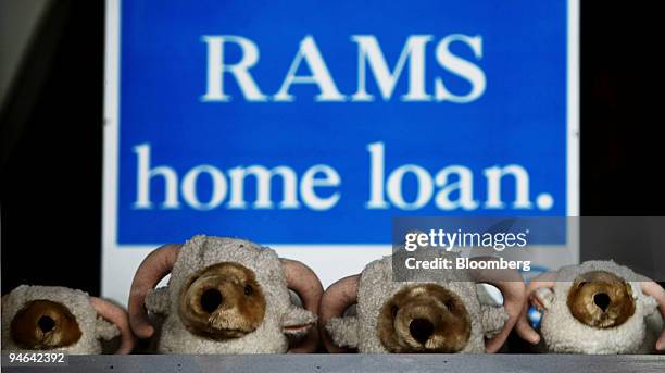 Rams Home Loans Group Pty Ltd. Mascots are displayed in the window of a Rams Home Loans shop in Sydney, Australia, on Monday, Aug. 20, 2007. Rams...
