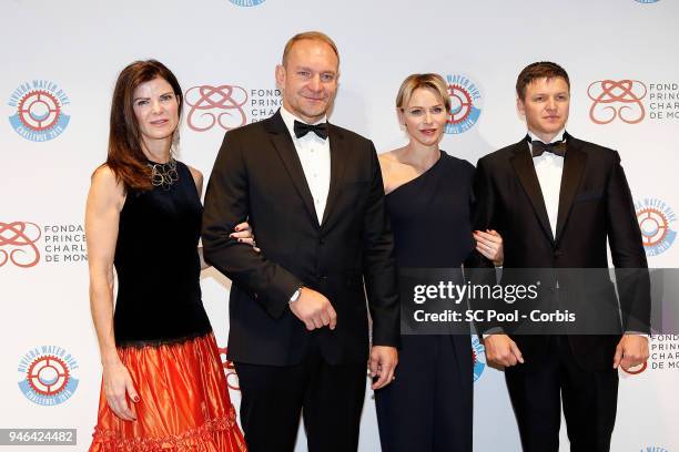 Nerine and Francois Pienaar, Princess Charlene of Monaco and Gareth Wittstock attend 'Riviera Water Bike Challenge' Gala at YCM on April 14, 2018 in...