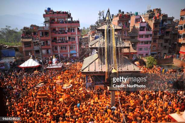 Nepalese devotees carrying the chariot of goddess during the celebration of &quot;Sindoor Jatra&quot; vermillion powder festival as Nepalese New Year...