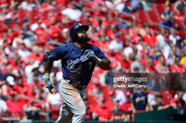 Eric Thames of the Milwaukee Brewers looks on after hitting a solo home run during the third inning against the St. Louis Cardinals at Busch Stadium...