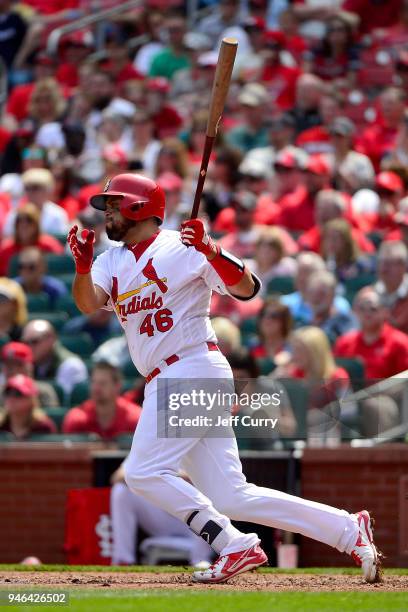 Francisco Pena of the St. Louis Cardinals hits a single during the fifth inning against the Milwaukee Brewers at Busch Stadium on April 11, 2018 in...