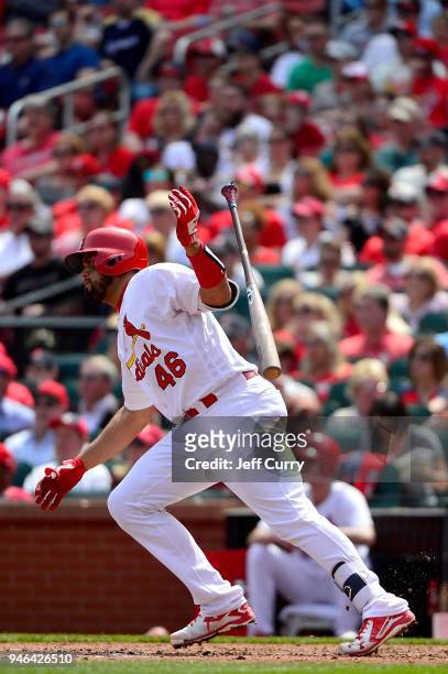 Francisco Pena of the St. Louis Cardinals hits a single during the fifth inning against the Milwaukee Brewers at Busch Stadium on April 11, 2018 in...