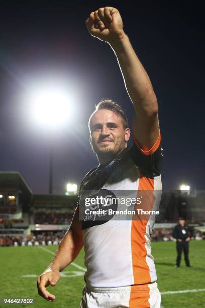 Josh Reynolds of the Tigers celebrates at full time during the round six NRL match between the Manly Sea Eagles and the Wests Tigers at Lottoland on...