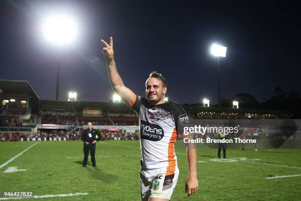 Josh Reynolds of the Tigers celebrates at full time during the round six NRL match between the Manly Sea Eagles and the Wests Tigers at Lottoland on...