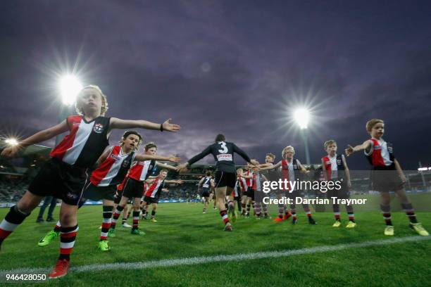 Jack Steven of the Saints runs back out onto the ground after the half time break during the round four AFL match between the Geelong Cats and the St...