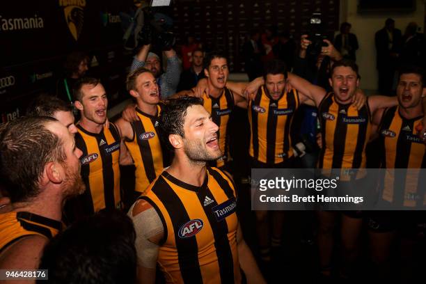 David Mirra of the Hawks celebrates victory with team mates during the round four AFL match between the Hawthorn Hawks and the Melbourne Demons at...