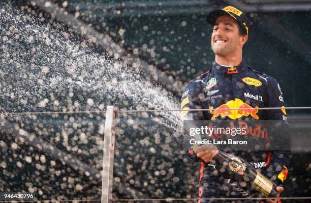 Race winner Daniel Ricciardo of Australia and Red Bull Racing celebrates on the podium during the Formula One Grand Prix of China at Shanghai...