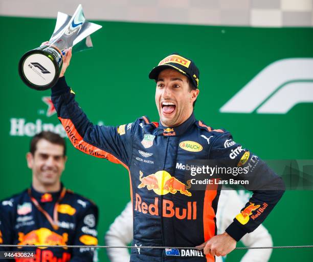 Race winner Daniel Ricciardo of Australia and Red Bull Racing celebrates on the podium during the Formula One Grand Prix of China at Shanghai...
