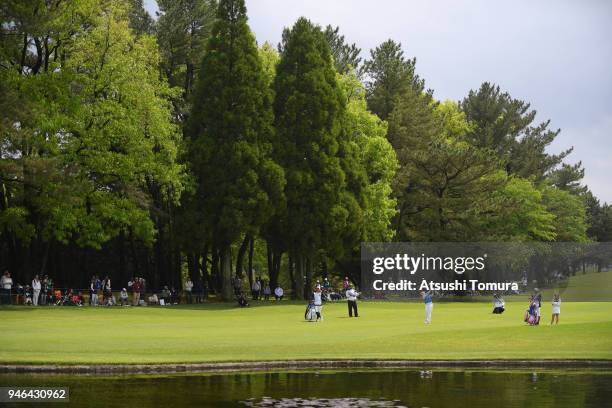 Saki Nagamine of Japan hits her third shot on the 18th hole during the final round of the KKT Cup Vantelin Ladies Open at the Kumamoto Kuko Country...