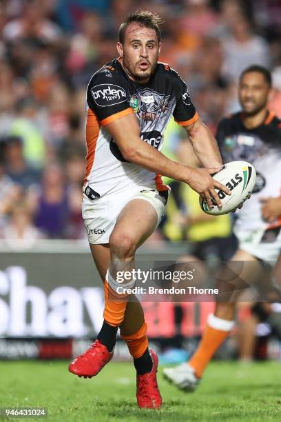 Josh Reynolds of the Tigers runs the ball during the round six NRL match between the Manly Sea Eagles and the Wests Tigers at Lottoland on April 15,...