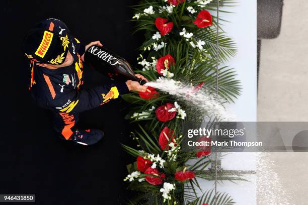 Race winner Daniel Ricciardo of Australia and Red Bull Racing celebrates on the podium during the Formula One Grand Prix of China at Shanghai...