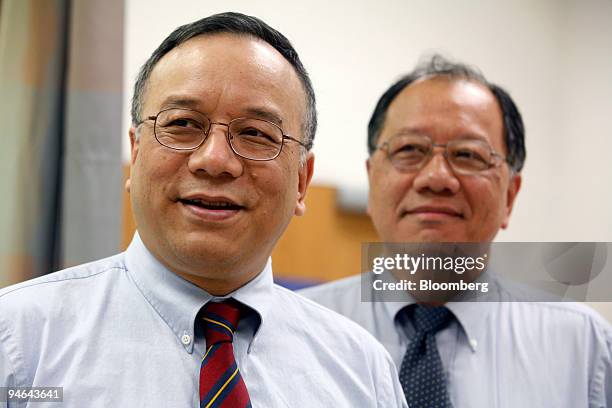 Dr. John Eng, left, and his brother Dr. Calvin Eng, a cardiologist, pose for a photograph, July 10 at the James J. Peters Veterans Affairs Medical...