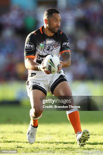 Benji Marshall of the Tigers runs the ball during the round six NRL match between the Manly Sea Eagles and the Wests Tigers at Lottoland on April 15,...