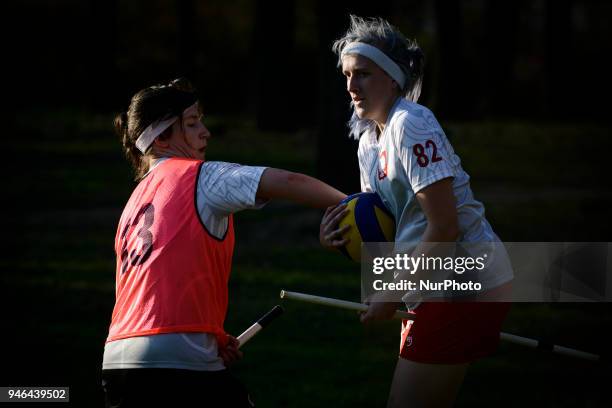 People are seen practicing the fictional Quidditch ball game in Mokotowski Park in Warsaw, Poland on April 14, 2018. Quidditch is a contact sport...