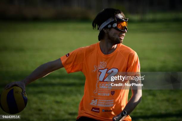 People are seen practicing the fictional Quidditch ball game in Mokotowski Park in Warsaw, Poland on April 14, 2018. Quidditch is a contact sport...