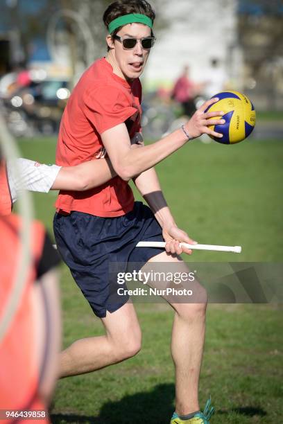 People are seen practicing the fictional Quidditch ball game in Mokotowski Park in Warsaw, Poland on April 14, 2018. Quidditch is a contact sport...