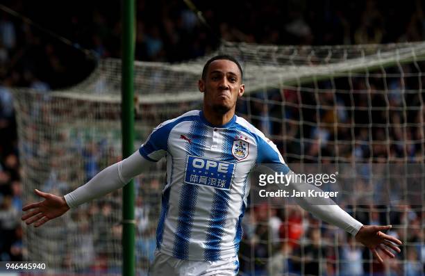 Tom Ince of Huddersfield Town celebrates after scoring his sides first goal during the Premier League match between Huddersfield Town and Watford at...