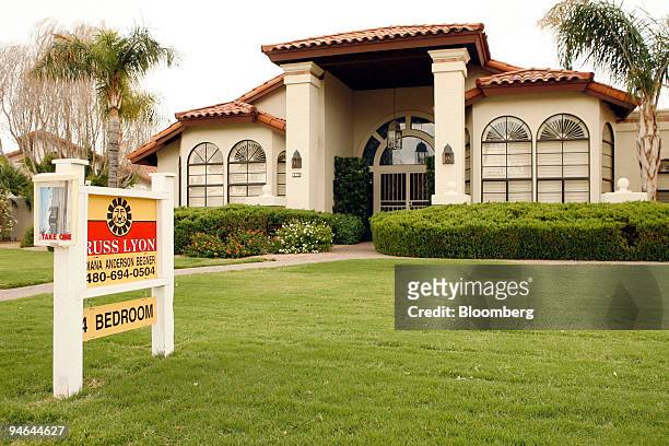 For sale sign sits outside of a house in Scottsdale, Arizona, on Friday, Aug. 17, 2007. Bear Stearns Cos. Moved to cut jobs at two home-lending units...